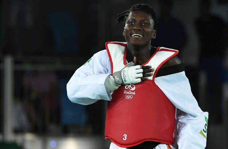 Ivory Coast's Ruth Gbagbi celebrates after winning against Azerbaijan's Farida Azizova in their women’s taekwondo bronze medal bout in the -67kg category
