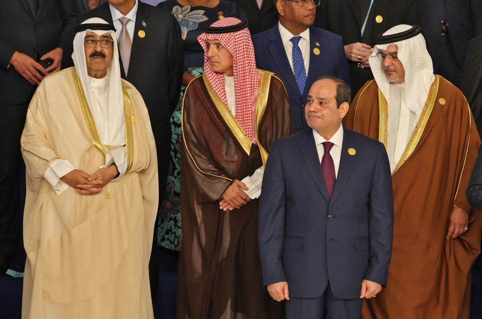 (L to R) Crown Prince and deputy Emir of Kuwait Sheikh Meshal al-Ahmad al-Jaber al-Sabah, Saudi Minister of State for Foreign Affairs Adel al-Jubeir, Egypt's President Abdel Fattah al-Sisi, and Bahrain's Crown Prince Salman bin Hamad al-Khalifa, stand among participating world leaders for a group picture ahead of their summit at the COP27 climate conference, in Egypt's Red Sea resort city of Sharm el-Sheikh, on November 7, 2022. (Photo by AHMAD GHARABLI / AFP) (Photo by AHMAD GHARABLI/AFP via Getty Images)