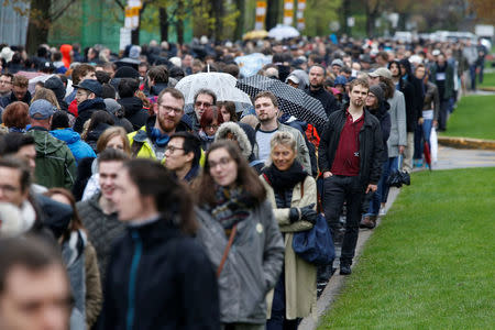 French citizens wait in line to cast their votes in the second round of the French presidential elections at the College Stanislas in Montreal, Quebec, Canada, May 6, 2017. REUTERS/Chris Wattie