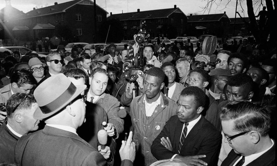 John Lewis, front with arms folded, in Selma in 1965.