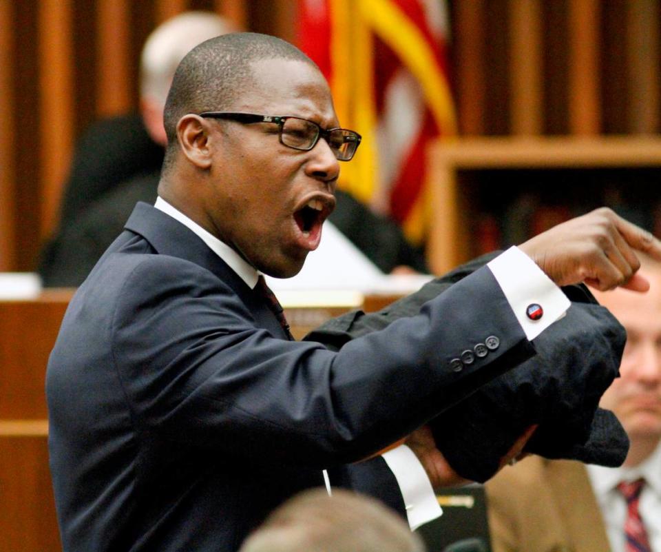 Attorney Stacey Jackson presents closing arguments in defense of his client Kareem Lane in Superior Court on September 4, 2014. Lane is being retried for murder in the 1992 stabbing death of former MCSD school superintendent Jim Burns. ROBIN TRIMARCHI/Ledger-Enquirer file photo