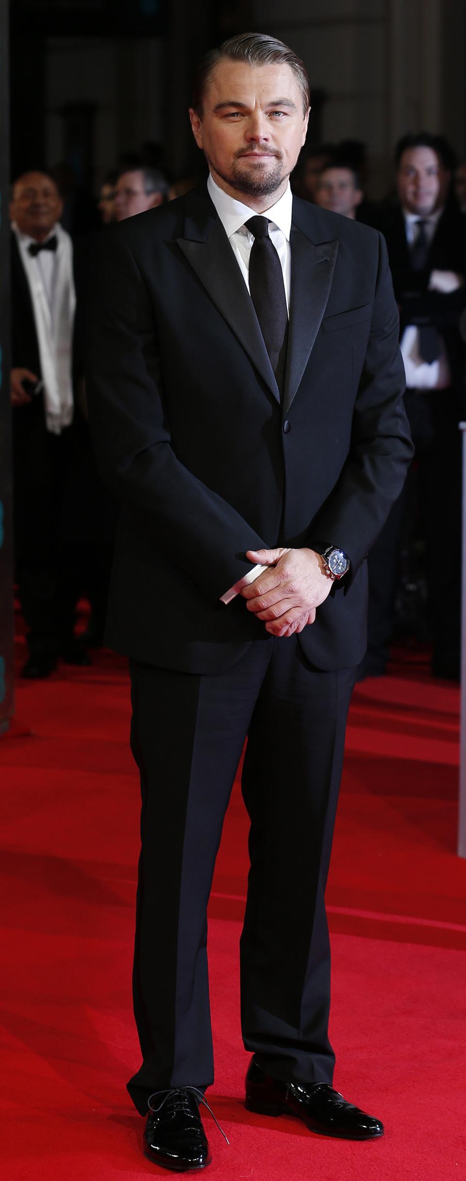 Leonardo DiCaprio arrives at the British Academy of Film and Arts (BAFTA) awards ceremony at the Royal Opera House in London February 16, 2014. REUTERS/Suzanne Plunkett (BRITAIN - Tags: ENTERTAINMENT)