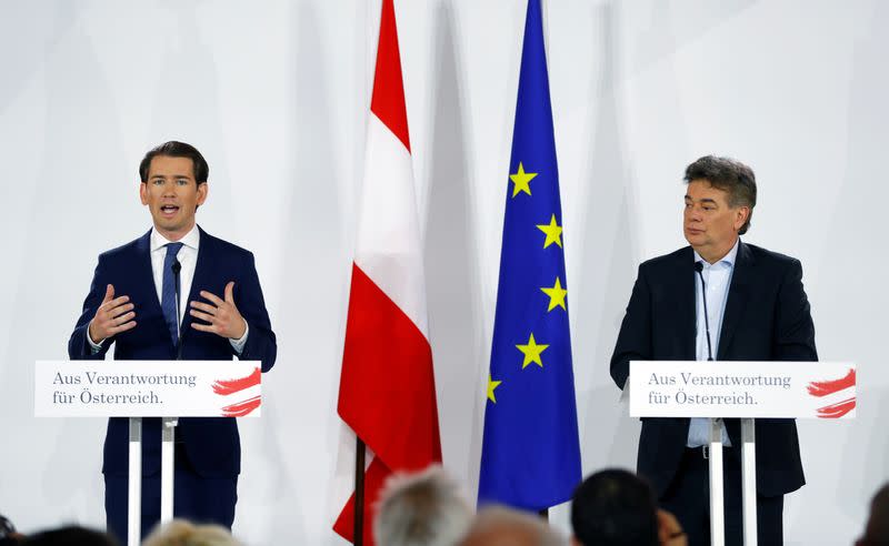 Head of Austria's Green Party Werner Kogler and head of People's Party Sebastian Kurz deliver a statement in Vienna