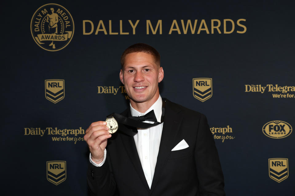 Kalyn Ponga poses with the Dally M award.