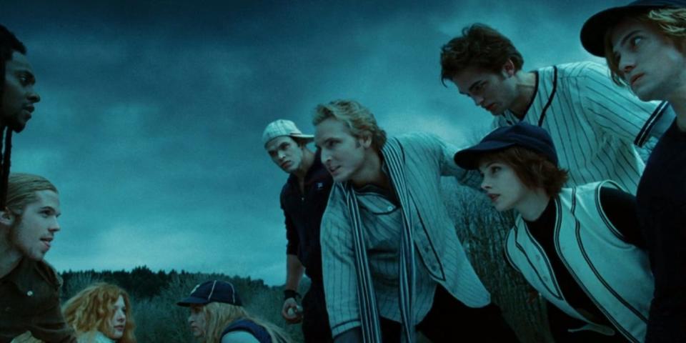 The villain vampire coven and the cullens (who are in baseball attire) facing off and growling at eachother in twilight