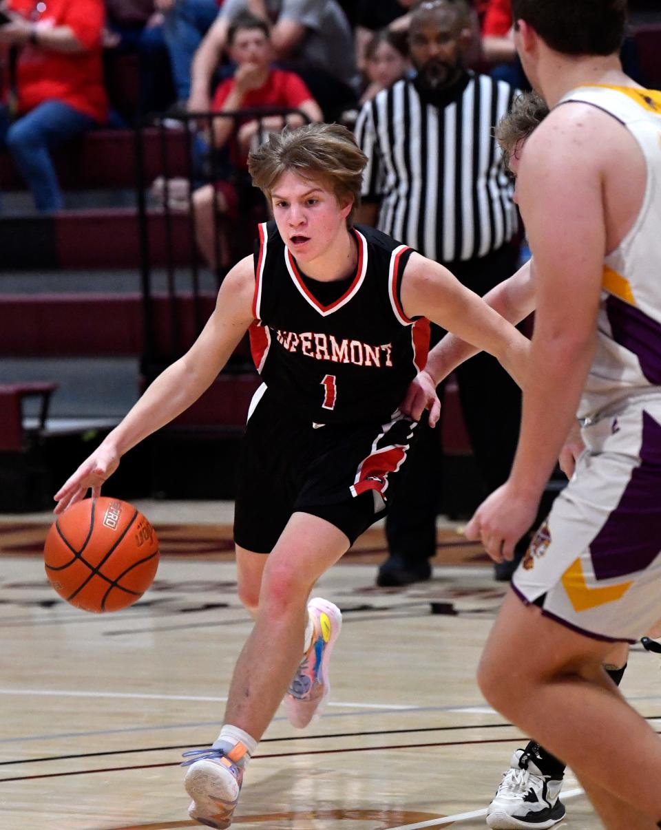 Aspermont's Kelton Van Meter looks for a opening in the Munday defense.