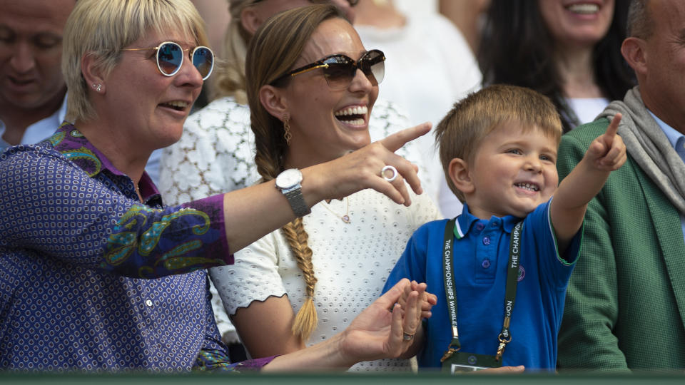 LONDON, ENGLAND – JULY 15: Jelena Djokovic and son Stefan Djokovic watch the trophy presentation after Novak Djokovic beat Kevin Anderson to win the Men’s Singles Final on day thirteeen of the Wimbledon Lawn Tennis Championships at All England Lawn Tennis and Croquet Club on July 15, 2018 in London, England. (Photo by Visionhaus/Getty Images)