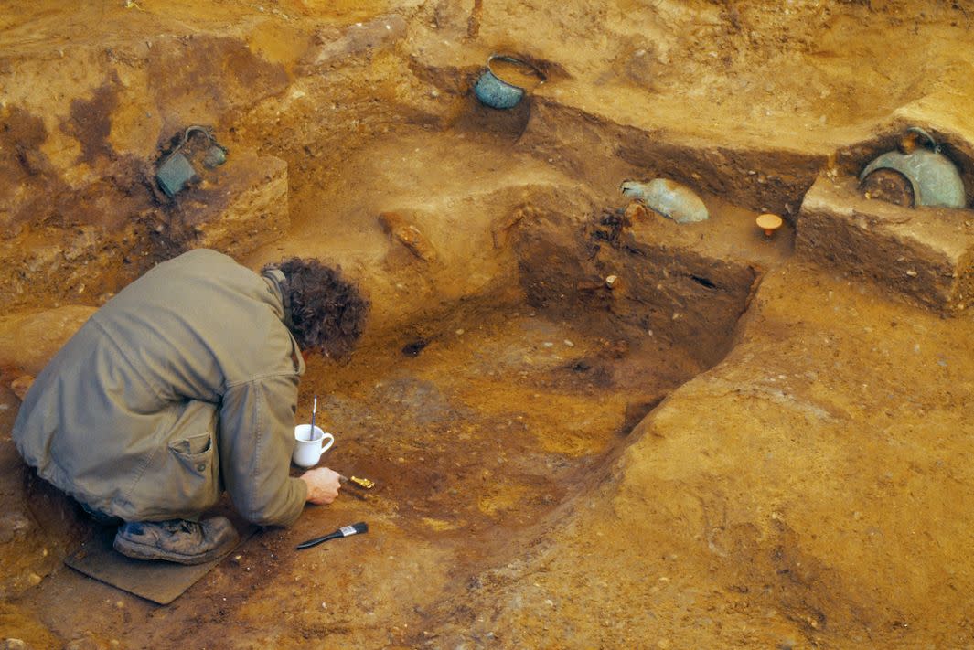 Archaeologists excavate the burial chamber in Prittlewell, Essex (PA)