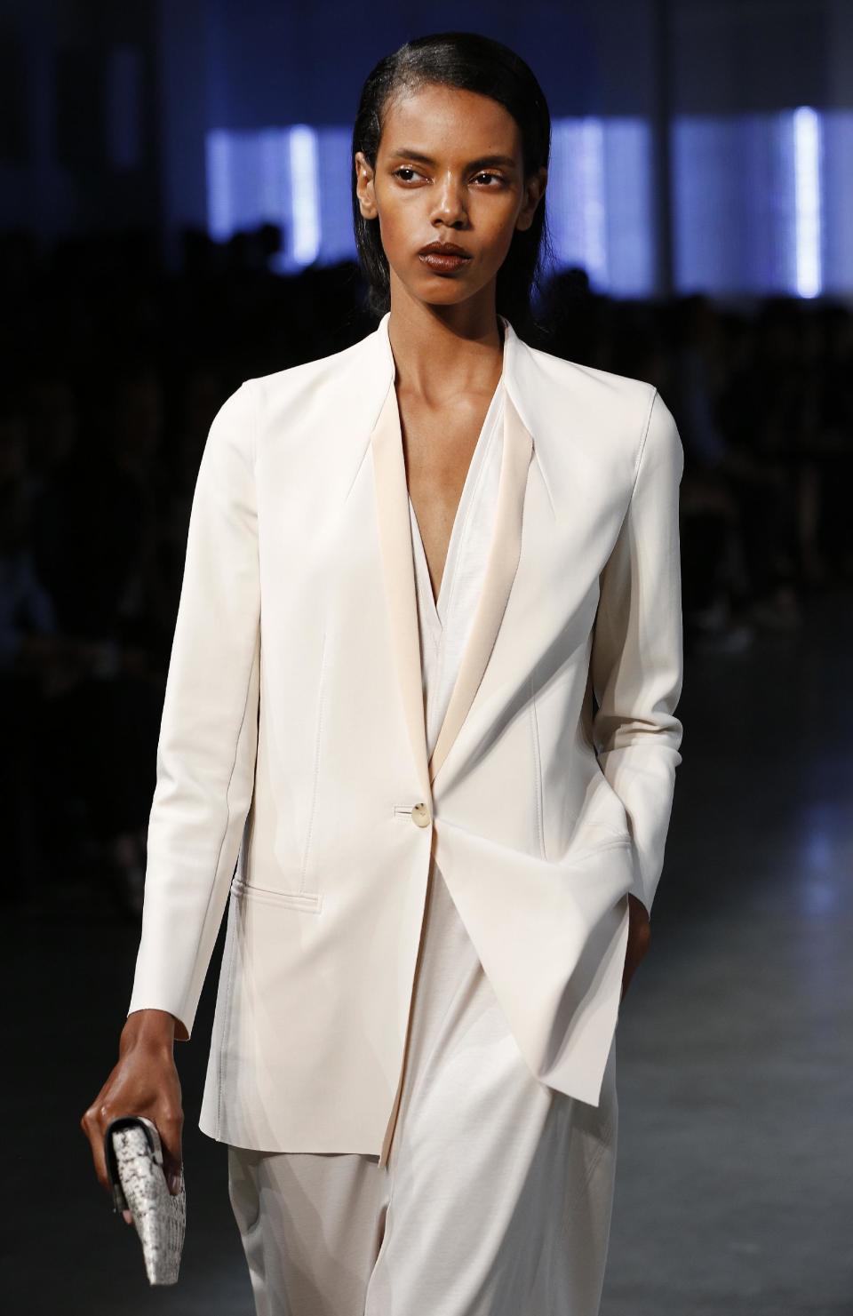 The Helmut Lang Spring 2014 collection is modeled during Fashion Week in New York, Friday, Sept. 6, 2013. (AP Photo/John Minchillo)