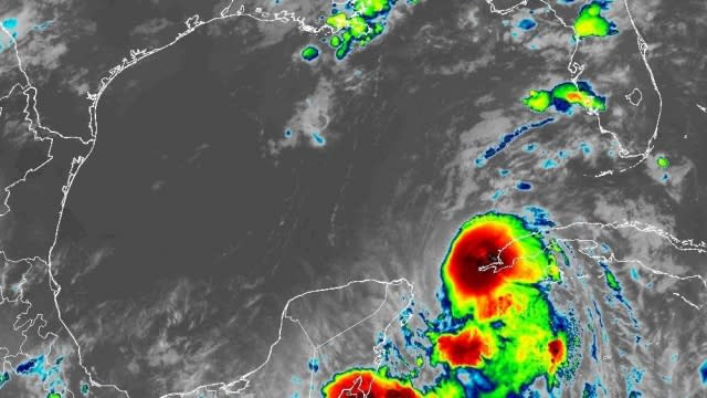 An infrared satellite view of Tropical Storm Idalia near Cuba on Monday night