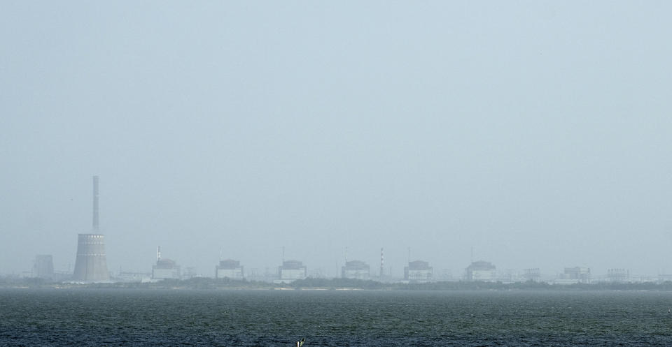 FILE - A view of the Zaporizhzhya nuclear plant and the Dnipro river on the other side of Nikopol, Ukraine on Aug, 22, 2022. (AP Photo/Evgeniy Maloletka, File)