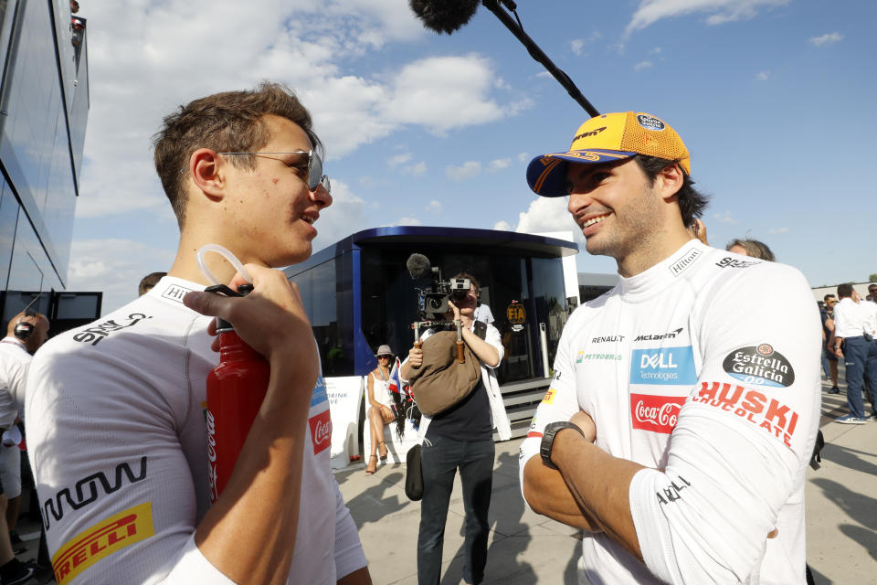 HUNGARORING, BUDAPEST, HUNGARY - 2019/08/04: Carlos Sainz Jr. and Lando Norris of McLaren F1 Team in the paddock during the F1 Grand Prix of Hungary. (Photo by Marco Canoniero/LightRocket via Getty Images)