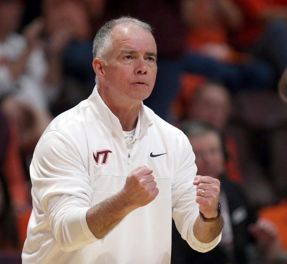 Virginia Tech head coach Mike Young reacts in the second half of an NCAA college basketball game against Louisville in Blacksburg, Va., Sunday, Dec. 3, 2023.