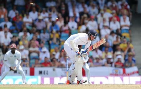 England's Stuart Broad is bowled by West Indies' Jerome Taylor (not pictured). Action Images via Reuters / Jason O'Brien Livepic