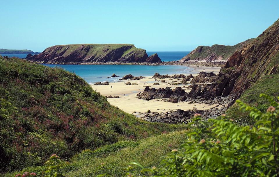 <p>A hidden gem on the western edge of Pembrokeshire, Marloes Sands is a wide, curved National Trust beach with amazing scenery and wildlife to explore. There's safe swimming and lovely coastal walks that start from the car park, plus you'll want to look out for seals and seabirds. The unique beach has sandstones and volcanic rocks for some of the most impressive geology around.</p><p><strong>Where to stay: </strong>A short drive from Marloes Sands lies a five-bedroom house that sleeps 10 people and one dog. It offers sea views and fantastic spaces for your group to socialise. <a class="link " href="https://go.redirectingat.com?id=127X1599956&url=https%3A%2F%2Fwww.homeaway.co.uk%2Fp1894019%3Farrival%3D2020-09-22%26departure%3D2020-09-25&sref=https%3A%2F%2Fwww.countryliving.com%2Fuk%2Ftravel-ideas%2Fstaycation-uk%2Fg32996826%2Fbest-beaches-wales%2F" rel="nofollow noopener" target="_blank" data-ylk="slk:SEE INSIDE;elm:context_link;itc:0;sec:content-canvas">SEE INSIDE</a></p>