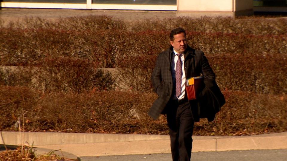 Defence lawyer T.J. Burke leaves the Saint John courthouse on Wednesday afternoon. 