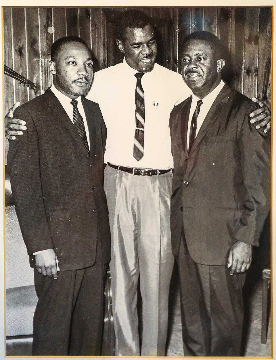 Dr. William Anderson, D.O., center, embraces civil rights leader Martin Luther King  Jr., left, and the Rev. Ralph Abernathy in a historical photo. Dr. Anderson, who is one of the nation's last living links to the original six of the American civil rights movement, was the founder of the Albany Movement in Georgia in the 1960s and worked closely with King.