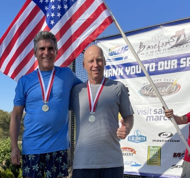 Southbridge's Kevin Keith, left, sporting one of the three gold medals he won in the senior 4 (65-plus) competition at the International Waterski & Waterboard Federation Masters Barefoot Tournament in San Marcos, Texas, stands next to Worcester's Doug Cusson, who won a silver medal in the senior 3 (55-plus) competition.