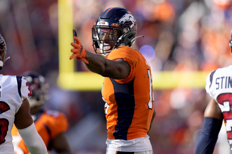 Denver Broncos wide receiver Courtland Sutton (14) signals first down against the Houston Texans during the second half of an NFL football game, Sunday, Sept. 18, 2022, in Denver. (AP Photo/David Zalubowski)