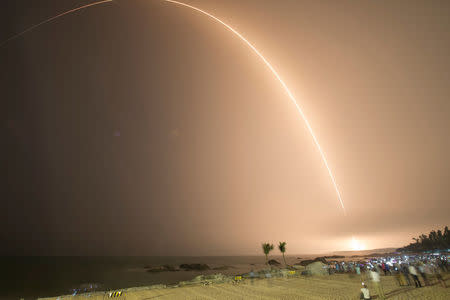 Long March-7 rocket carrying Tianzhou-1 cargo spacecraft lifts off from the launching pad in Wenchang, Hainan province, China, April 20, 2017. Picture taken April 20, 2017. Image taken with long exposure. China Daily/via REUTERS