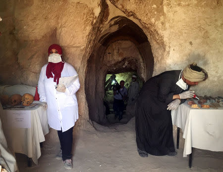 Egyptian archaeologists document the content of the tomb of Userhat, a judge from the New Kingdom at the Dra Abu-el Naga necropolis near the Nile city of Luxor, south of Cairo, Egypt April 18, 2017. REUTERS/Sherif Fahmy