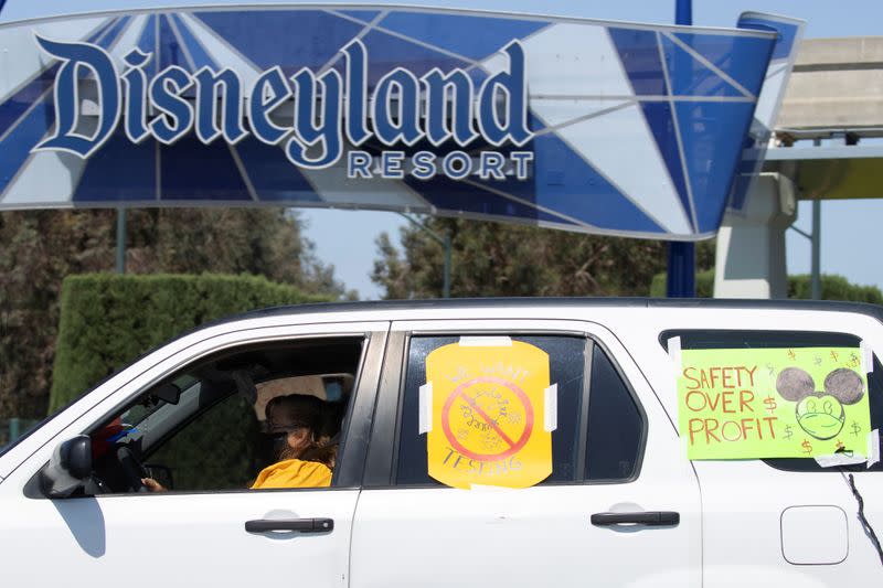 Disney cast members stage a car caravan outside Disneyland California, calling for higher safety standards for Disneyland to reopen