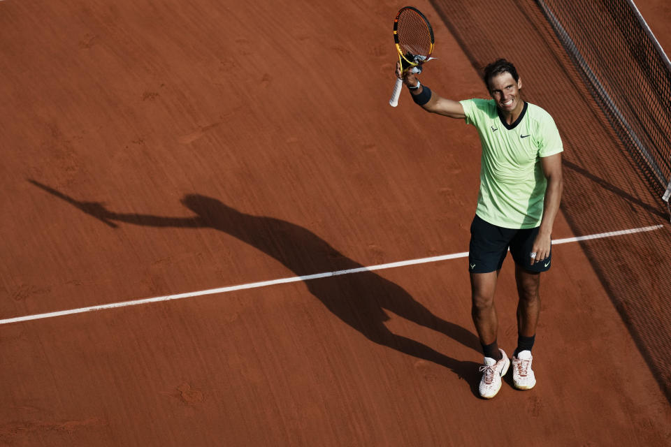 Spain's Rafael Nadal waves after defeating Argentina's Diego Schwartzman in their quarterfinal match of the French Open tennis tournament at the Roland Garros stadium Wednesday, June 9, 2021 in Paris. (AP Photo/Thibault Camus)