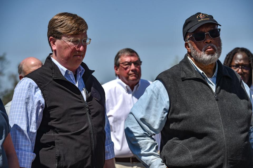 Governor Tate Reeves stands alongside U.S. Rep. Benny Thompson to address the media following Friday's deadly tornado in Rolling Fork on Sunday afternoon.