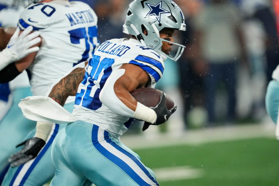 Dallas Cowboys running back <a class="link " href="https://sports.yahoo.com/nfl/players/31960" data-i13n="sec:content-canvas;subsec:anchor_text;elm:context_link" data-ylk="slk:Tony Pollard;sec:content-canvas;subsec:anchor_text;elm:context_link;itc:0">Tony Pollard</a> (20) runs with the ball at MetLife Stadium. Sunday, September 10, 2023