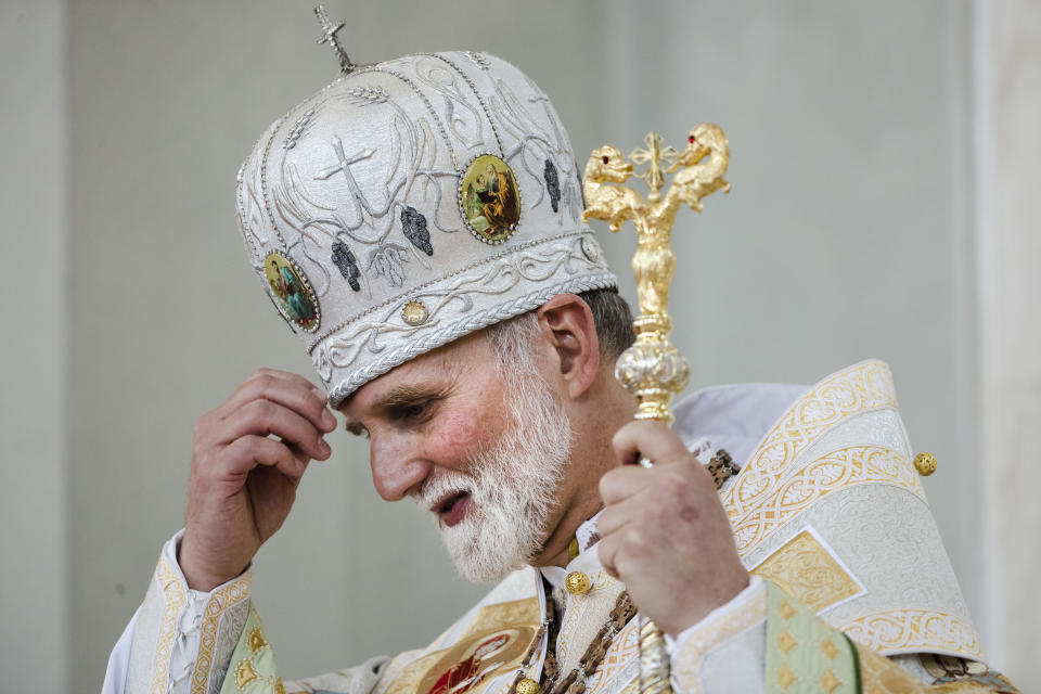 Newley installed Metropolitan Archbishop of the Ukrainian Catholic Diocese of Philadelphia Borys Gudziak blesses himself during a ceremony enthroning him into his new position at the Ukrainian Catholic Cathedral of the Immaculate Conception in Philadelphia, Tuesday, June 4, 2019. (AP Photo/Matt Rourke)