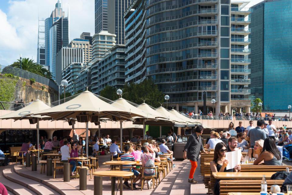 Pictured are people enjoying a sunny day at Opera Bar in Sydney.