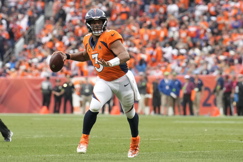 Denver Broncos quarterback Russell Wilson looks to throw a pass against the Las Vegas Raiders during the first half of an NFL football game, Sunday, Sept. 10, 2023, in Denver. (AP Photo/David Zalubowski)