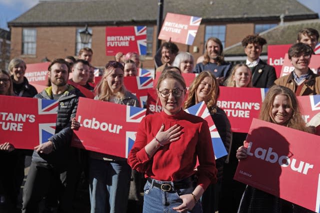 Newly elected Labour MP Gen Kitchen (centre) surrounded by Labour party supporters after being declared winner in the Wellingborough by-election