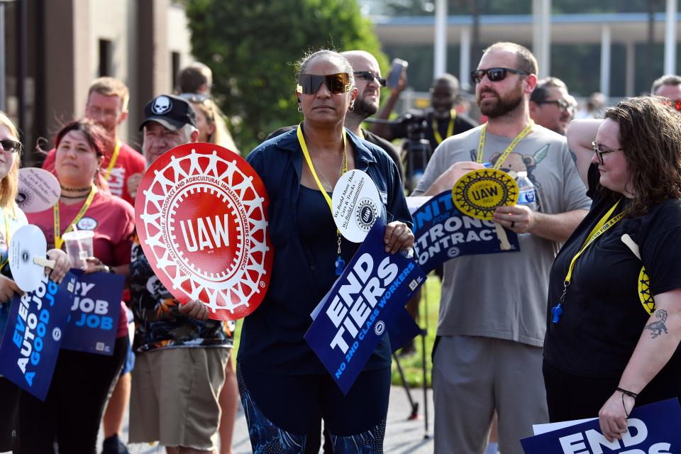 Members of United Auto Workers Local 862 gather for a practice picket at their union hall in Louisville, Ky., on Aug. 24, 2023. The demands that a more combative United Auto Workers union has made of General Motors, Stellantis and Ford — demands that even the UAW's president has called “audacious” — are edging it closer to a strike when its current contract ends Sept. 14.