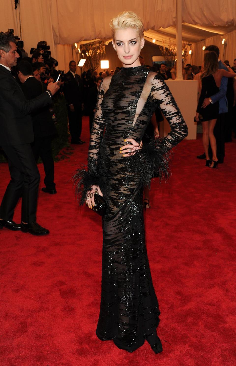 FILE - This May 6, 2013 file photo shows actress Anne Hathaway atThe Metropolitan Museum of Art Costume Institute gala benefit, "Punk: Chaos to Couture" in New York. The Metropolitan Museum of Art hosted a new Costume Institute exhibit, "Punk: Chaos to Culture," celebrating a movement that embraced anarchy in the 1970s. (Photo by Evan Agostini/Invision/AP, File)