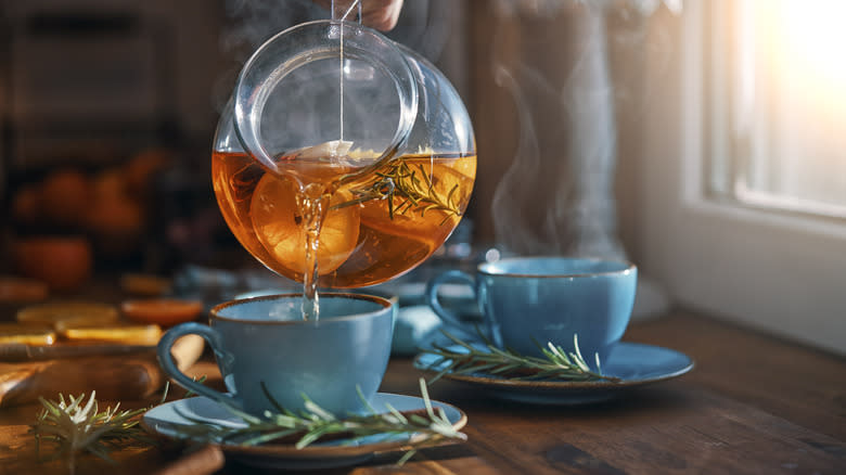 pouring tea from a teapot