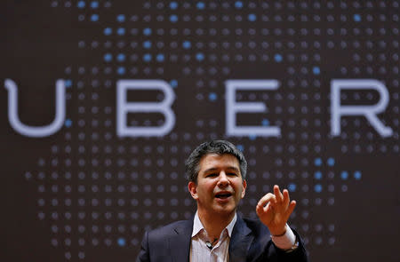 FILE PHOTO - Uber CEO Travis Kalanick speaks to students during an interaction at the Indian Institute of Technology (IIT) campus in Mumbai, India, January 19, 2016. REUTERS/Danish Siddiqui/File photo