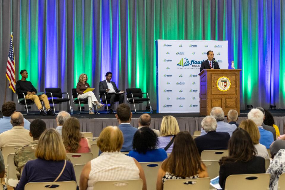 Officials from Flourish Beaver County discuss their goals and announce scholarship plans during a presentation at the Community College of Beaver County on August 30, 2023.