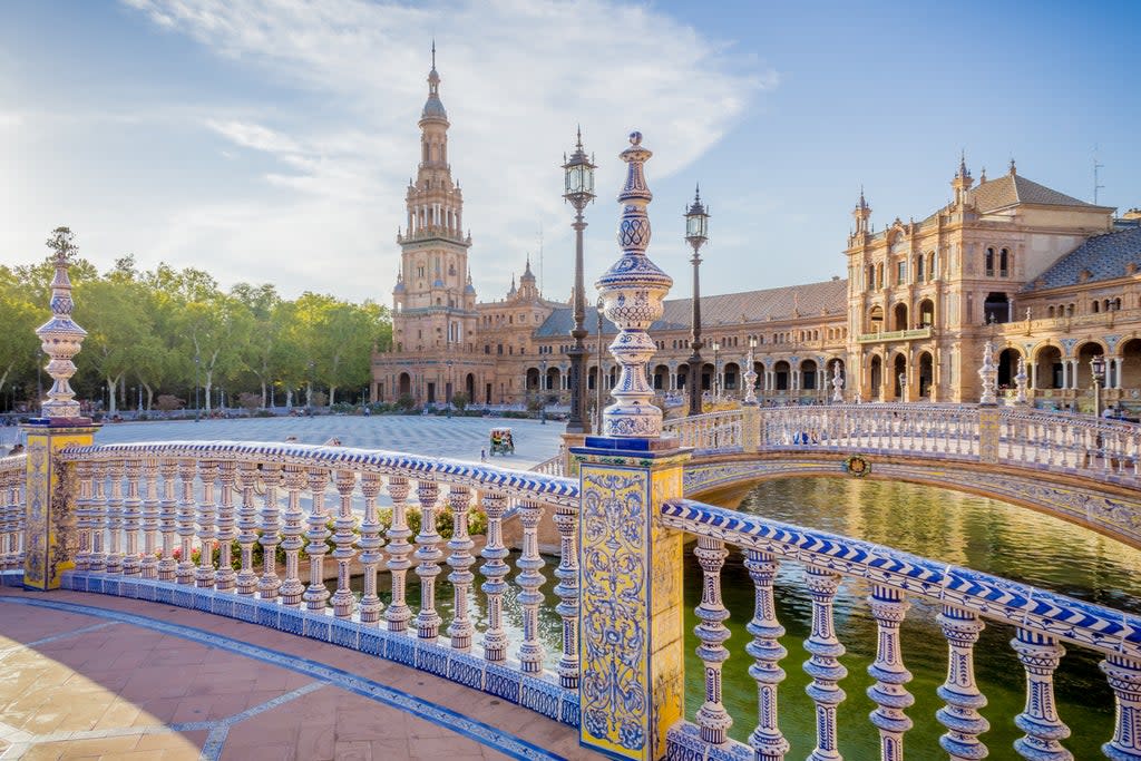 Plaza de Espana is a sprawl of ornate bridges, towers and arches, complete with luscious fountain (Getty/iStock)