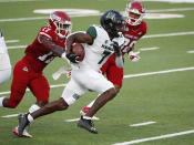 Hawaii running back Calvin Turner runs past Fresno State defensive back Deonte Perry for a long gain during the first half of an NCAA college football game in Fresno, Calif., Saturday, Oct. 24, 2020. (AP Photo/Gary Kazanjian)