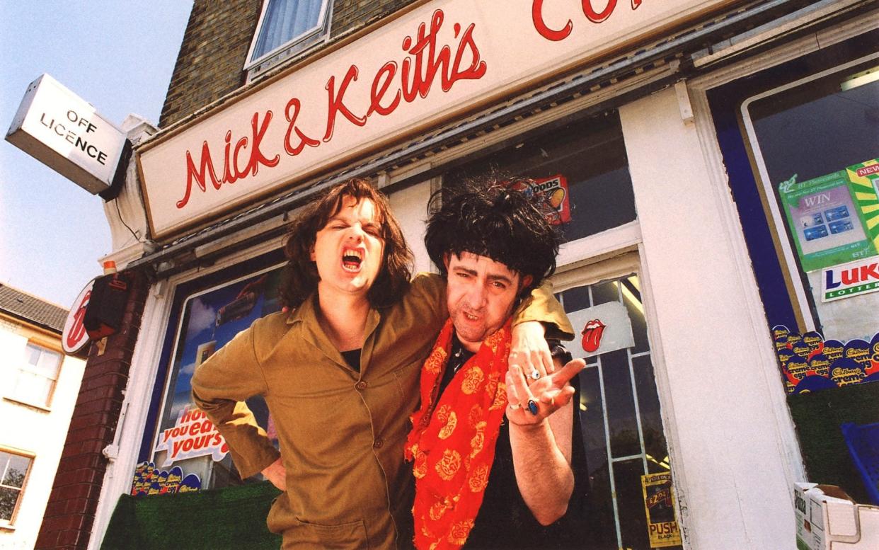 Phil Cornwell and John Sessions as Mick Jagger and Keith Richards - outside their little shop - BBC