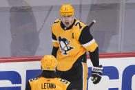 Pittsburgh Penguins' Evgeni Malkin (71) celebrates his goal during the first period in Game 5 of an NHL hockey Stanley Cup first-round playoff series against the New York Islanders in Pittsburgh, Monday, May 24, 2021. (AP Photo/Gene J. Puskar)