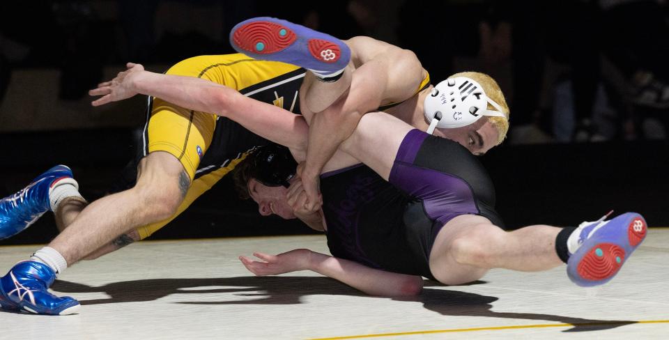 St. John Vianney's Anthony Knox (left) is shown during his bout against Rumson-Fair Haven's Elijah Bayne Wednesday night. Knox pinned. St. John Vianney won 44-26.