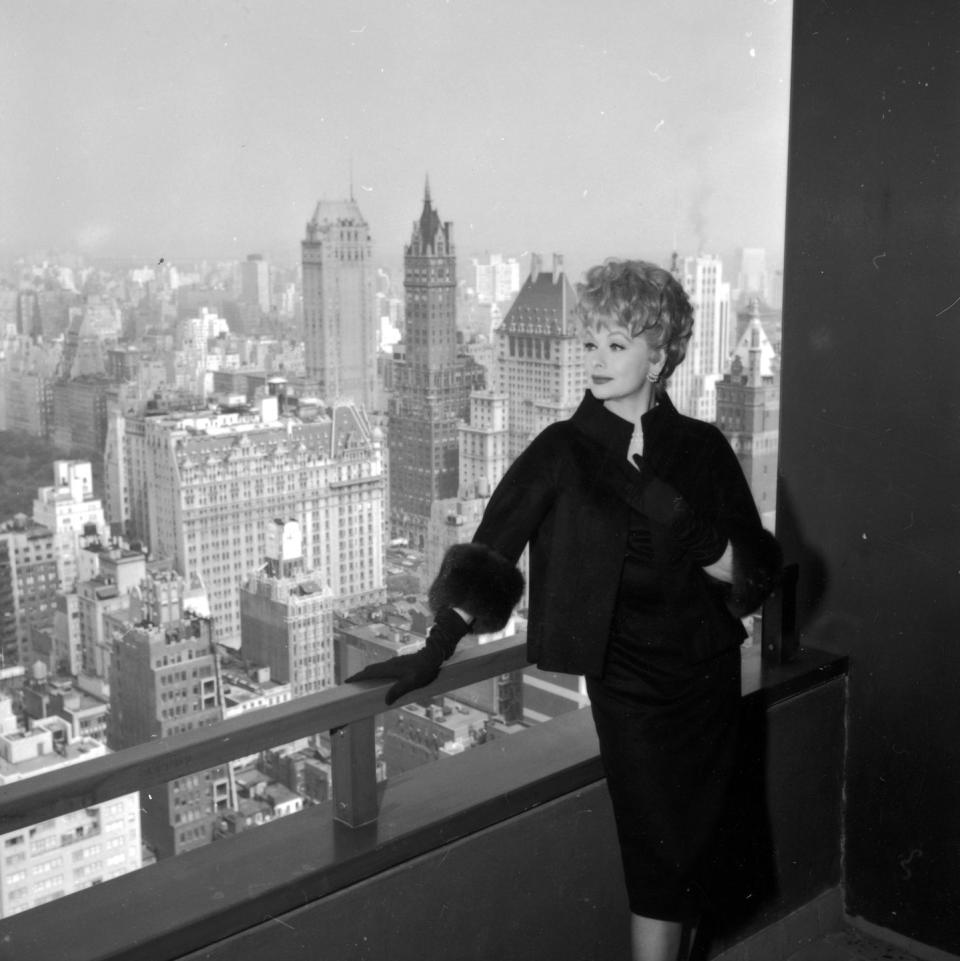 1965: Looking over the balcony of her Manhattan apartment