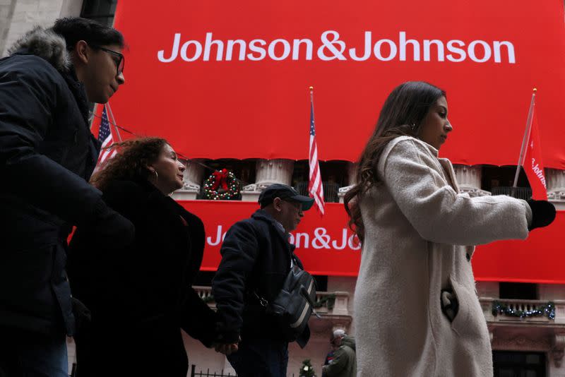 FILE PHOTO: A Johnson & Johnson banner is displayed on the front of the NYSE in New York