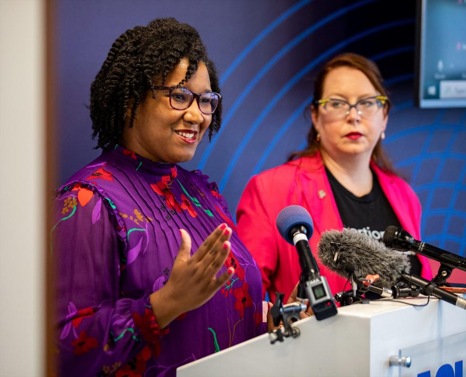 Amber Duke (left) of ACLU of KY and Tamarra Wieder with Planned Parenthood Advocates talk to members of the media during a press conference to speak about the judge's ruling today that allows abortions to resume temporarily in Kentucky while legal challenge is underway. June 30, 2022