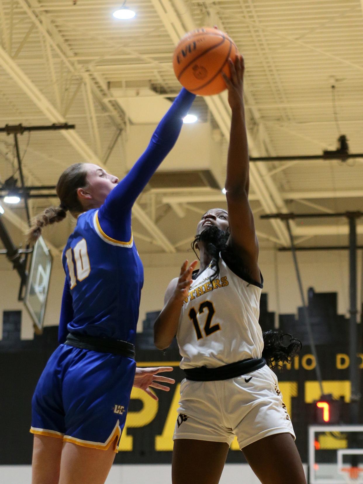 Ursuline freshman Sophia Kline blocks Ohio Dominican sophomore Logan Pride on Thursday, January 11, 2024. Ursuline beat Ohio Dominican 67-54 in a game featuring three Newark graduates and Kline, a Berne Union graduate.