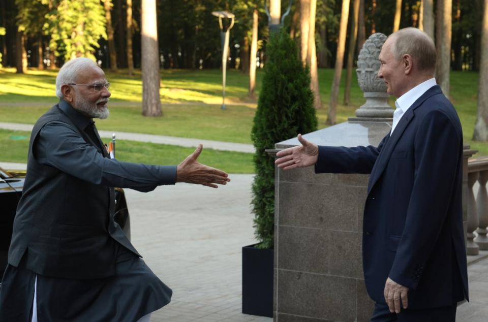 Narendra Modi arrives at Vladimir Putin’s residence (EPA)