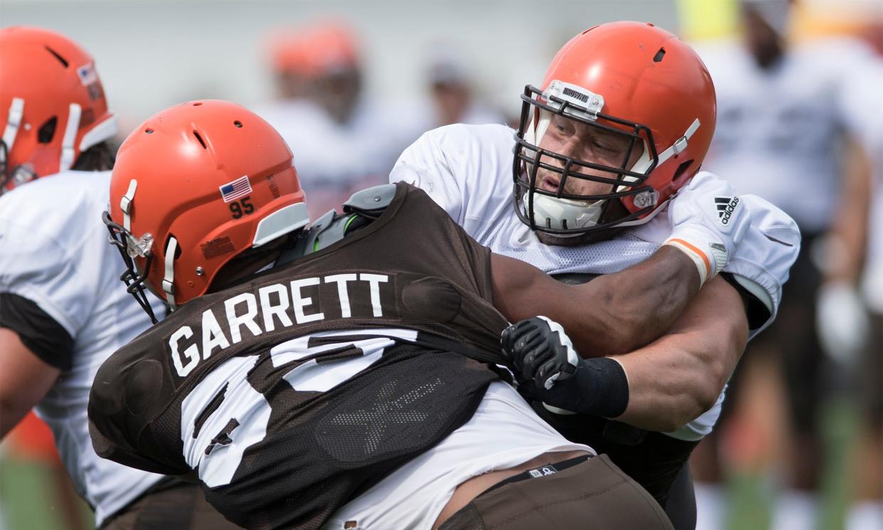 Cleveland Browns offensive tackle Joel Bitonio works against defensive end Myles Garrett during NFL football training camp, Thursday, Aug. 2, 2018, in Berea, Ohio. (AP Photo/Ken Blaze) ORG XMIT: OHKB126