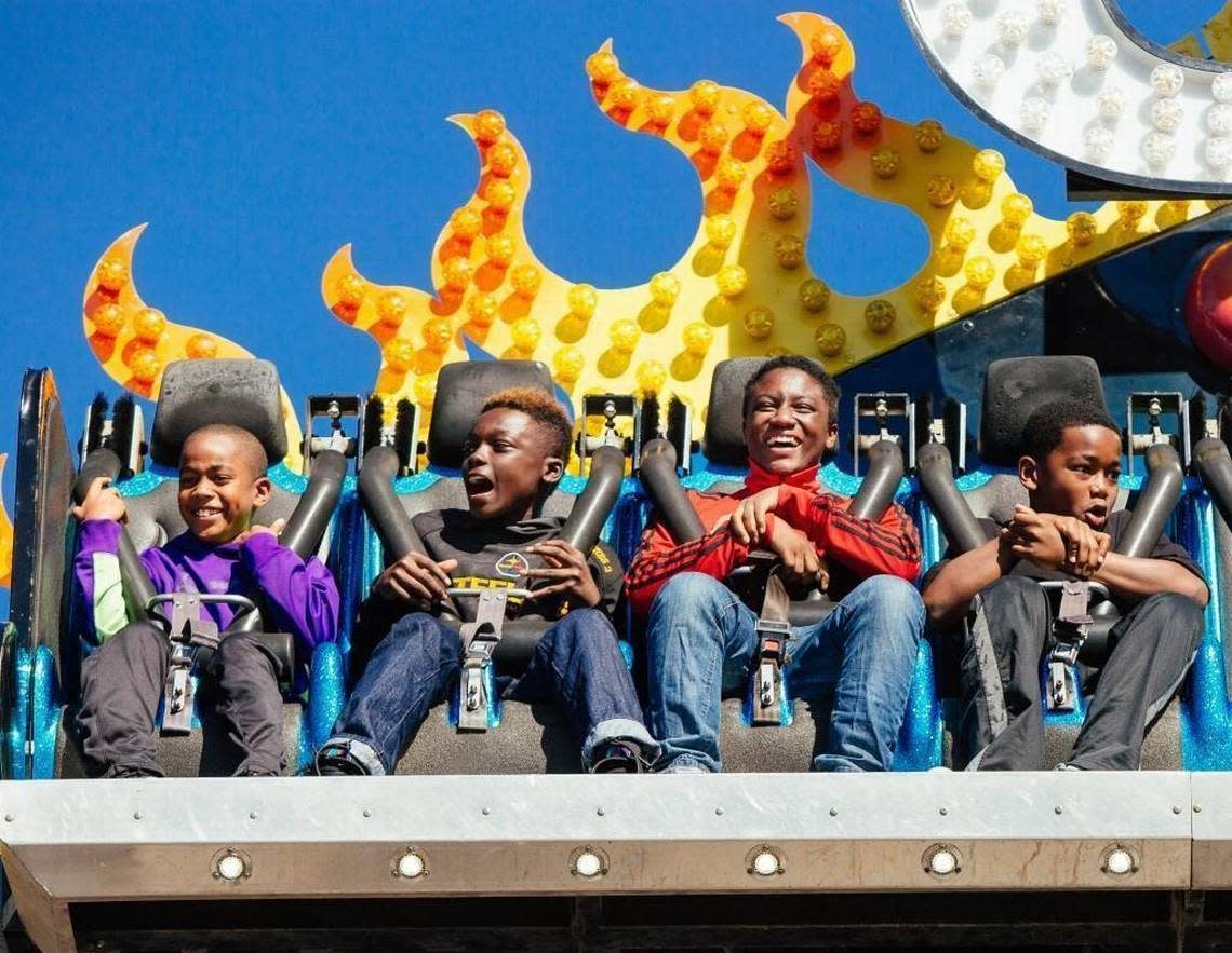 Riders board the Genesis during the final day of the N.C. State Fair in Raleigh in October 2016.